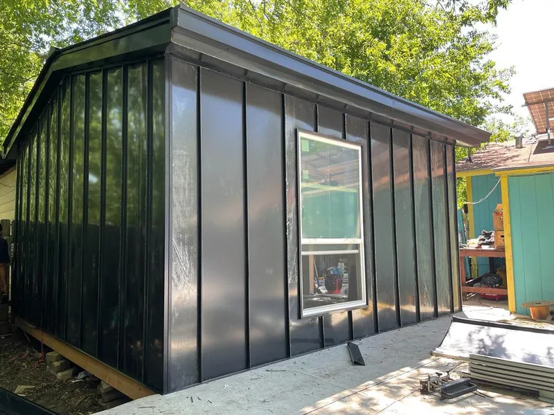 Black standing seam metal wall panels for Roof Inspection in Thornton