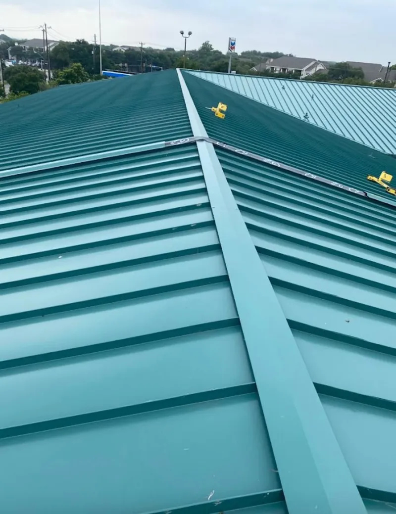 Green commercial metal roof ridge and valley for Metal Roof Repair in Thornton