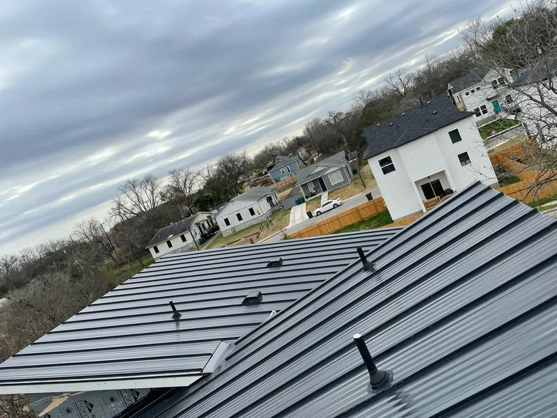Standing seam metal roof panels with vents for Skylight Repair in Thornton